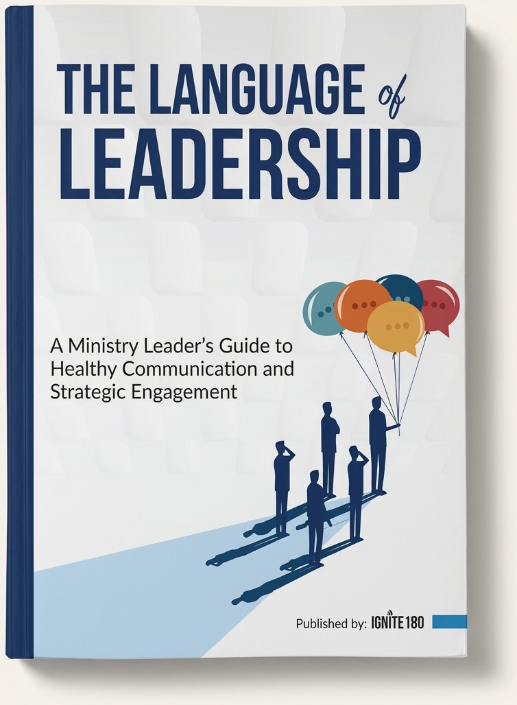 The Language of Leadership paperback book standing on a light surface